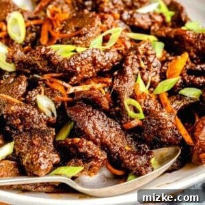 A serving platter full of crispy beef.