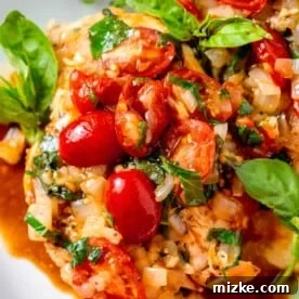 20 Quick Chicken Dinners for Busy Weeknight Meals 6 fresh grape tomatoes and basil and onions on top of chicken breasts