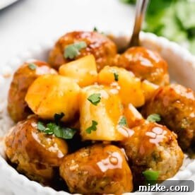 Slow cooker sweet and sour meatballs with pineapple