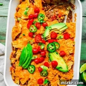 Taco casserole in a white baking dish